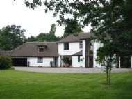 Pheasant Field House with new side extensions and two storey entrance